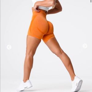 NVGTN Burnt Orange Seamless Contour Shorts